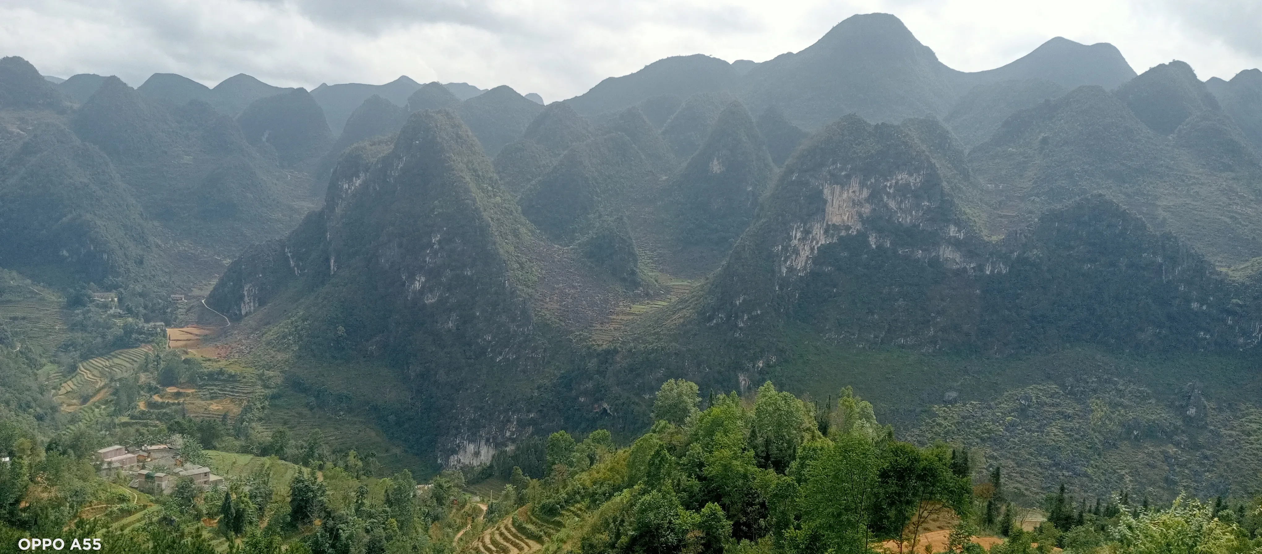 Cone-karst mountains and small cultivated valleys on the Dong Van Karst Plateau.