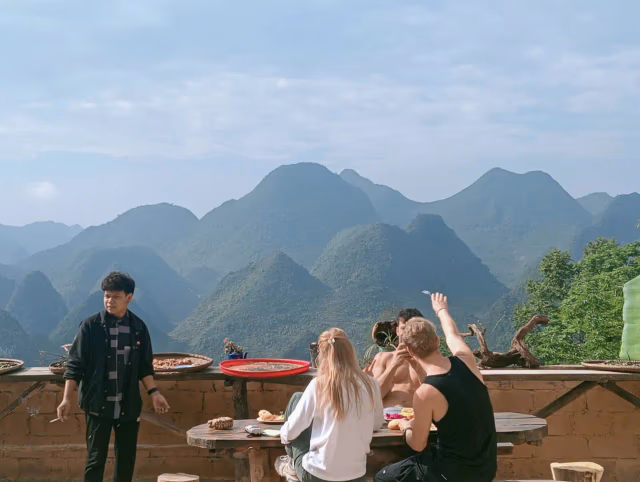 Lo Lo Chai homestay and mud-walled village houses on the northern plateau edge