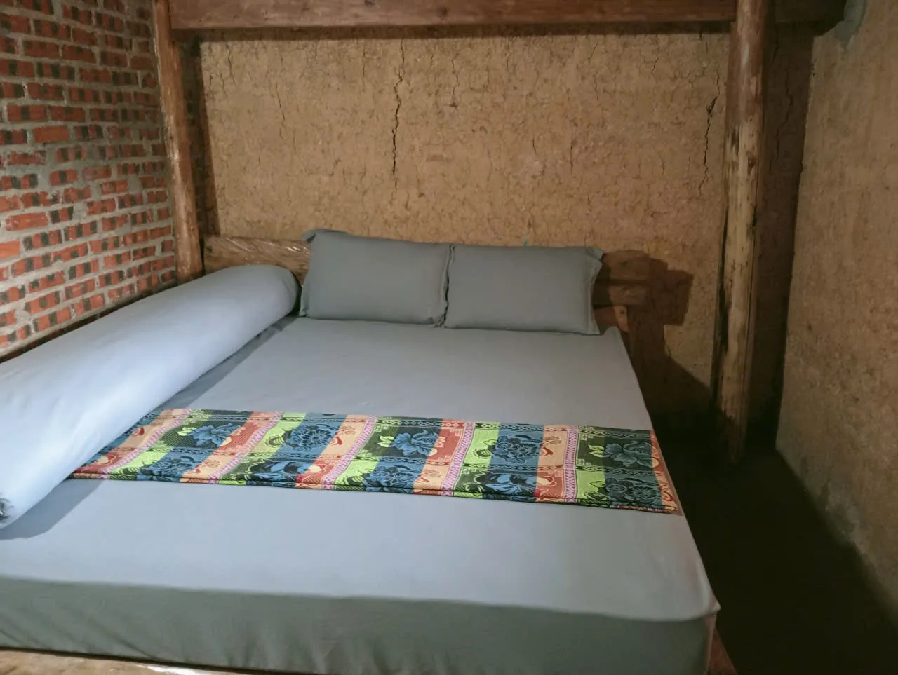 Guest bed in a homestay room in Lo Lo Chai, eastern Ha Giang