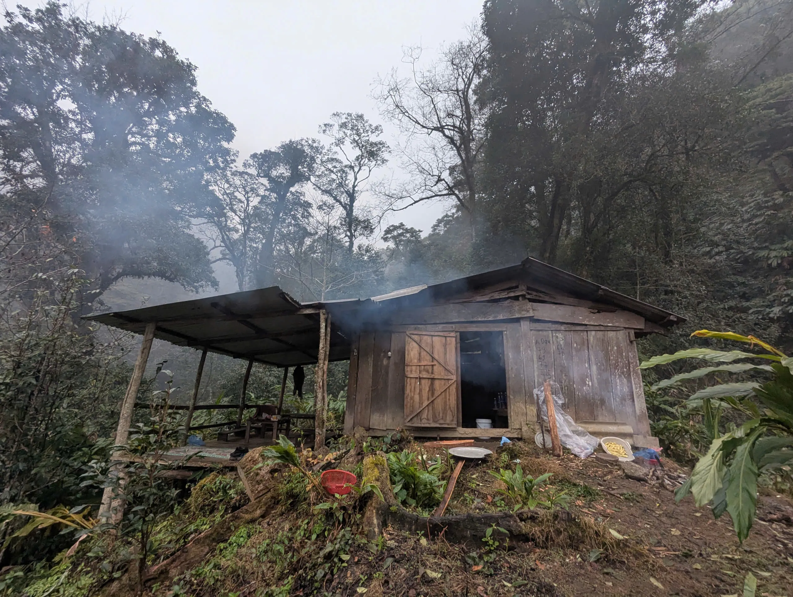 Simple forest shelter used on the Tung San Tay Con Linh trek